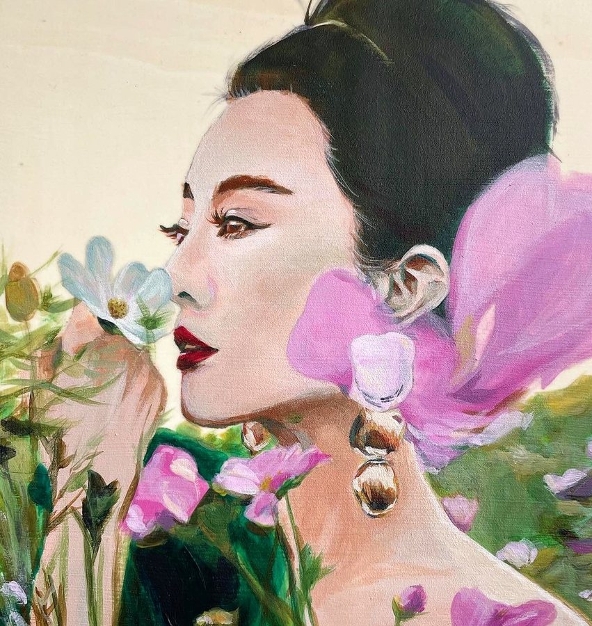 Profile of a woman among pink flowers
